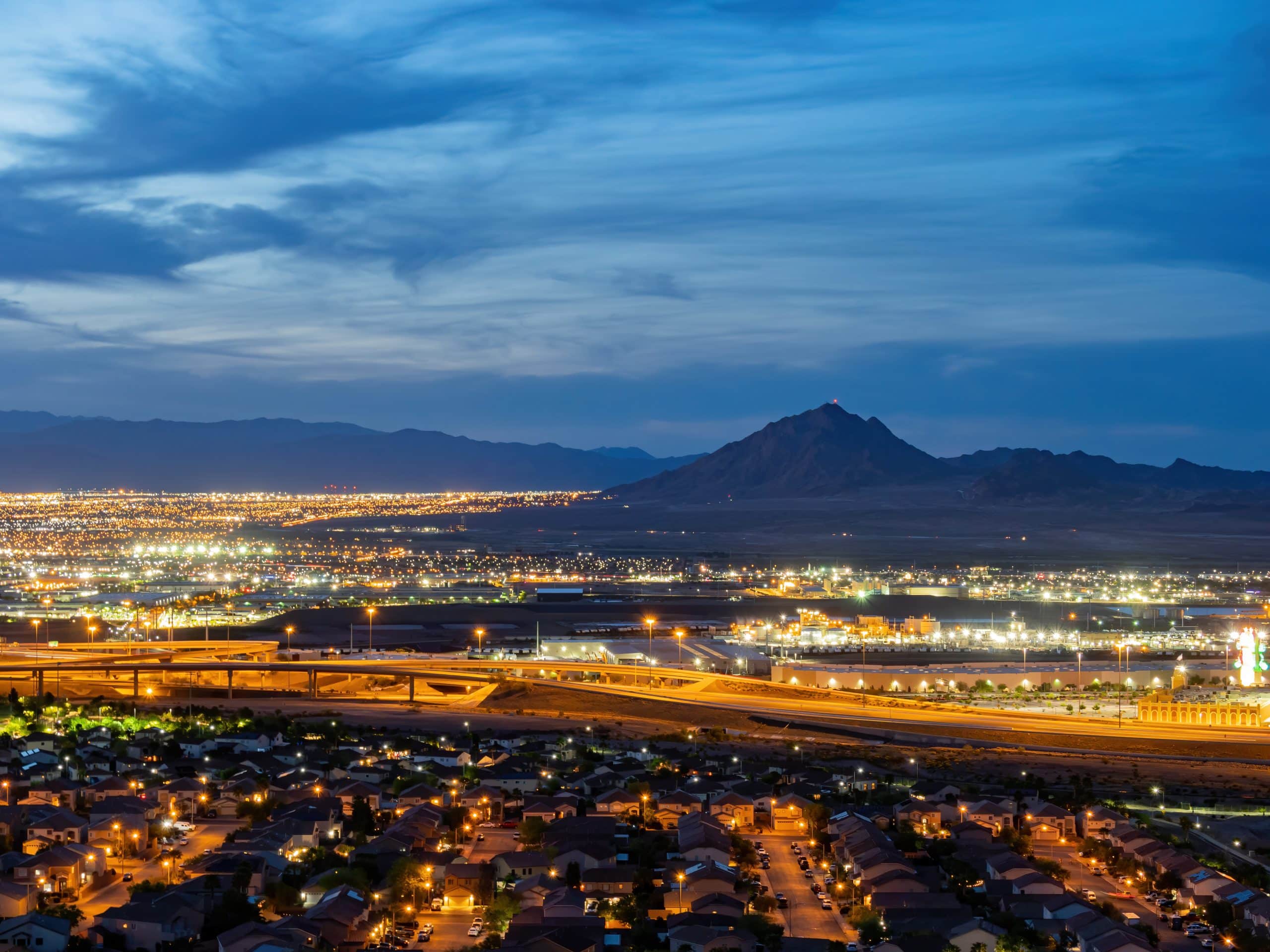 dusk high angle view of the frenchman mountain and cityscape from henderson view pass